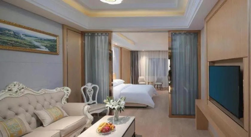 Bed in Vienna Hotel Jiangsu Kunshan Qiandeng Town