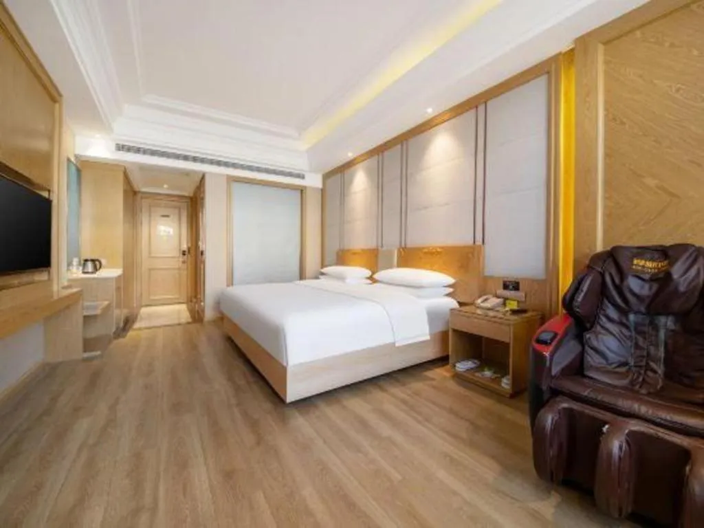 Bed in Vienna Hotel Jiangsu Kunshan Qiandeng Town