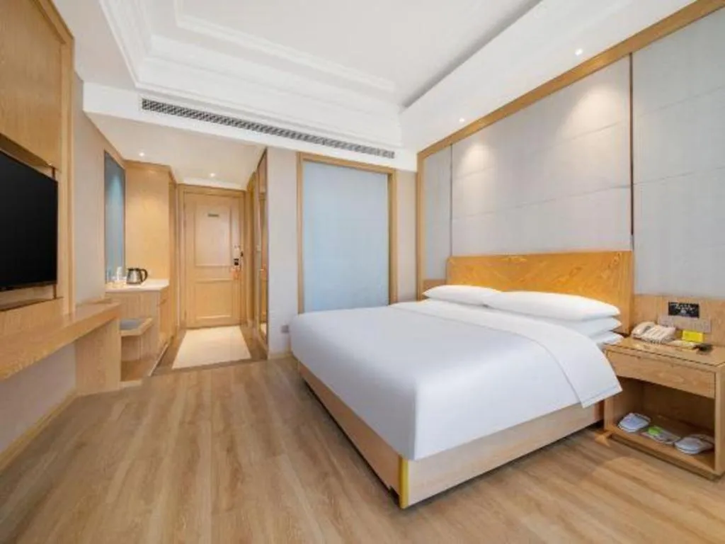 Bed in Vienna Hotel Jiangsu Kunshan Qiandeng Town
