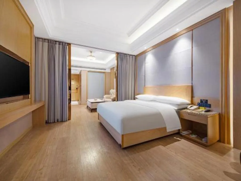 Bed in Vienna Hotel Jiangsu Kunshan Qiandeng Town