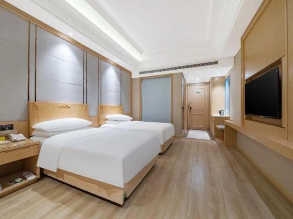 Bed in Vienna Hotel Jiangsu Kunshan Qiandeng Town
