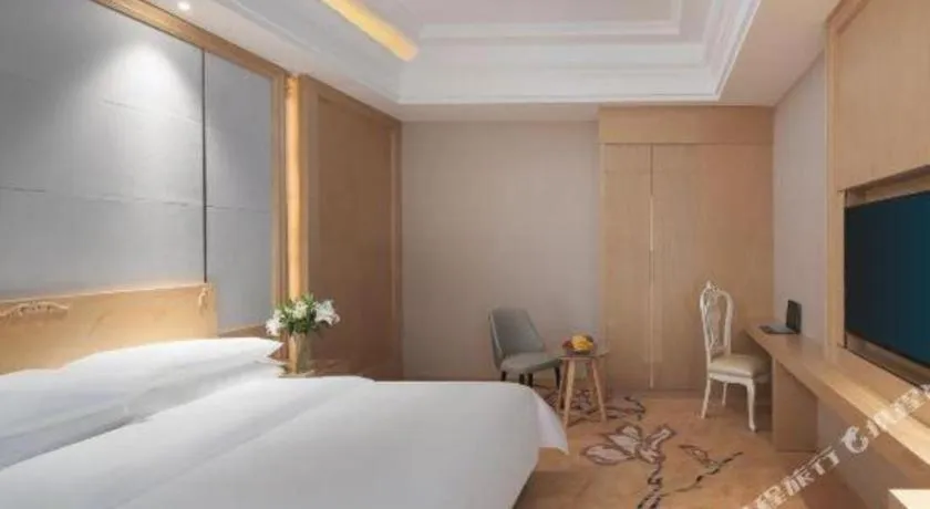 Bed in Vienna Hotel Jiangsu Kunshan Qiandeng Town