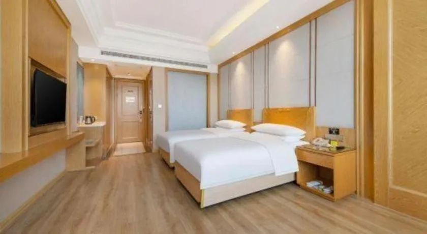 Bed in Vienna Hotel Jiangsu Kunshan Qiandeng Town