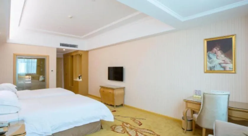 Bed in Vienna Hotel Guangzhou Huadu Sunac Cultural Tourism City Shiling