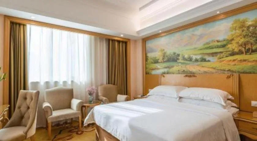 Bed in Vienna Hotel Guangzhou Huadu Sunac Cultural Tourism City Shiling