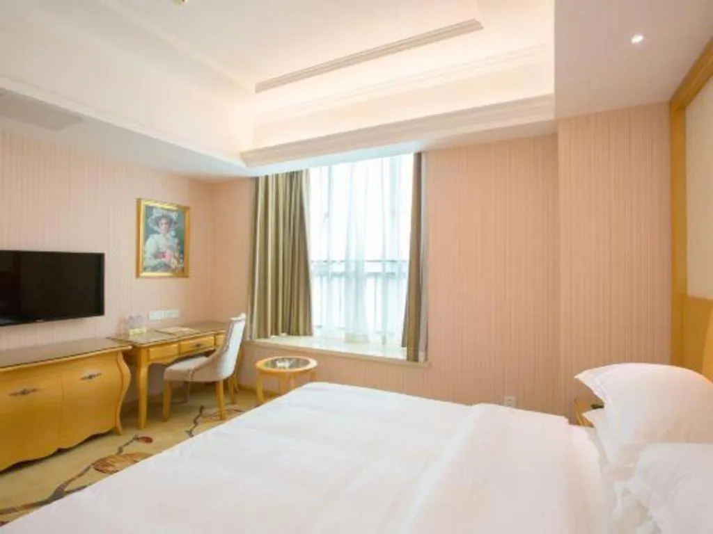 Bed in Vienna Hotel Guangzhou Huadu Sunac Cultural Tourism City Shiling
