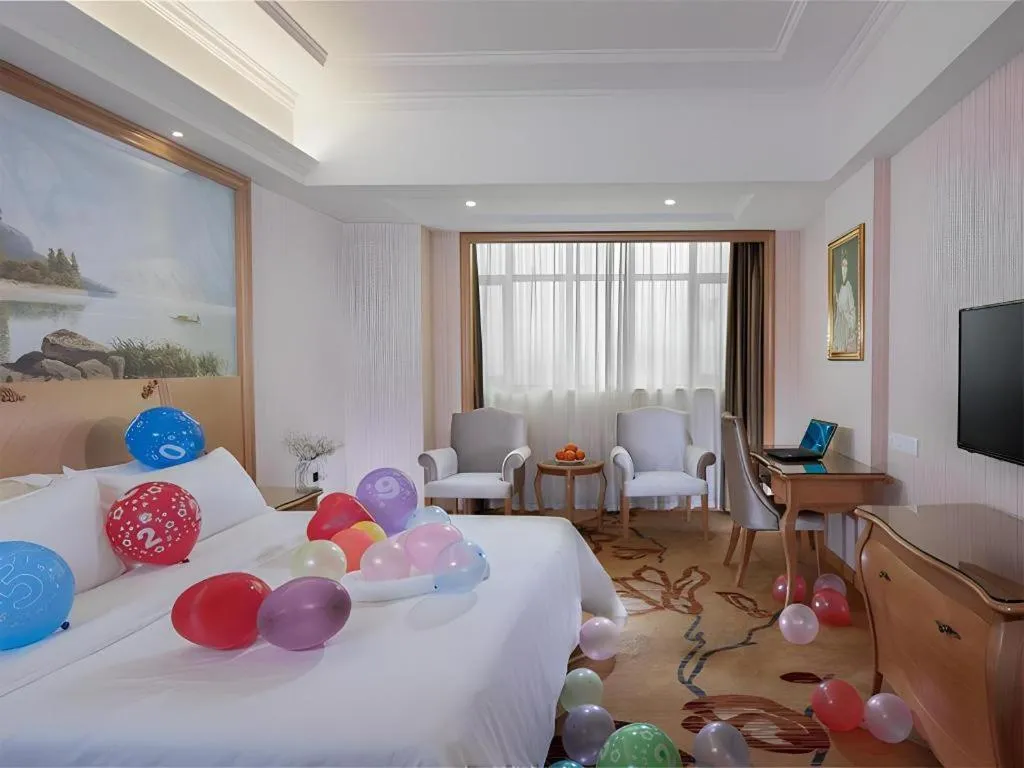 Bed in Vienna Hotel Guangzhou Huadu Sunac Cultural Tourism City Shiling
