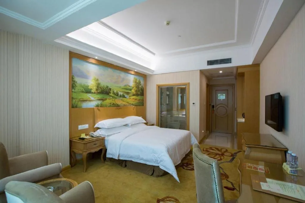 Bed in Vienna Hotel Guangzhou Huadu Sunac Cultural Tourism City Shiling