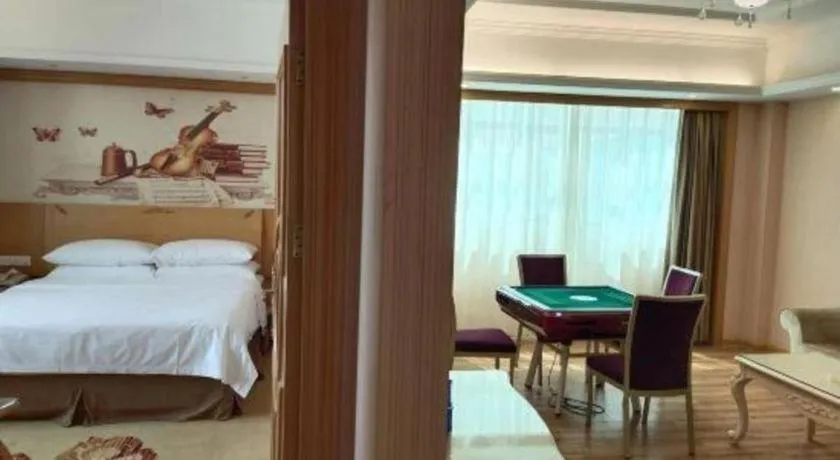 Bed in Vienna Hotel Guangzhou Huadu Sunac Cultural Tourism City Shiling