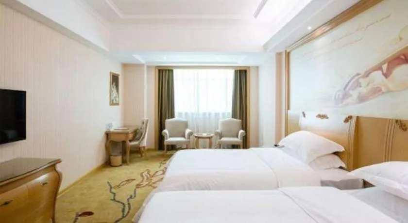 Bed in Vienna Hotel Guangzhou Huadu Sunac Cultural Tourism City Shiling