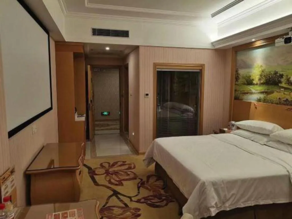 Bed in Vienna Hotel Guangzhou Huadu Sunac Cultural Tourism City Shiling
