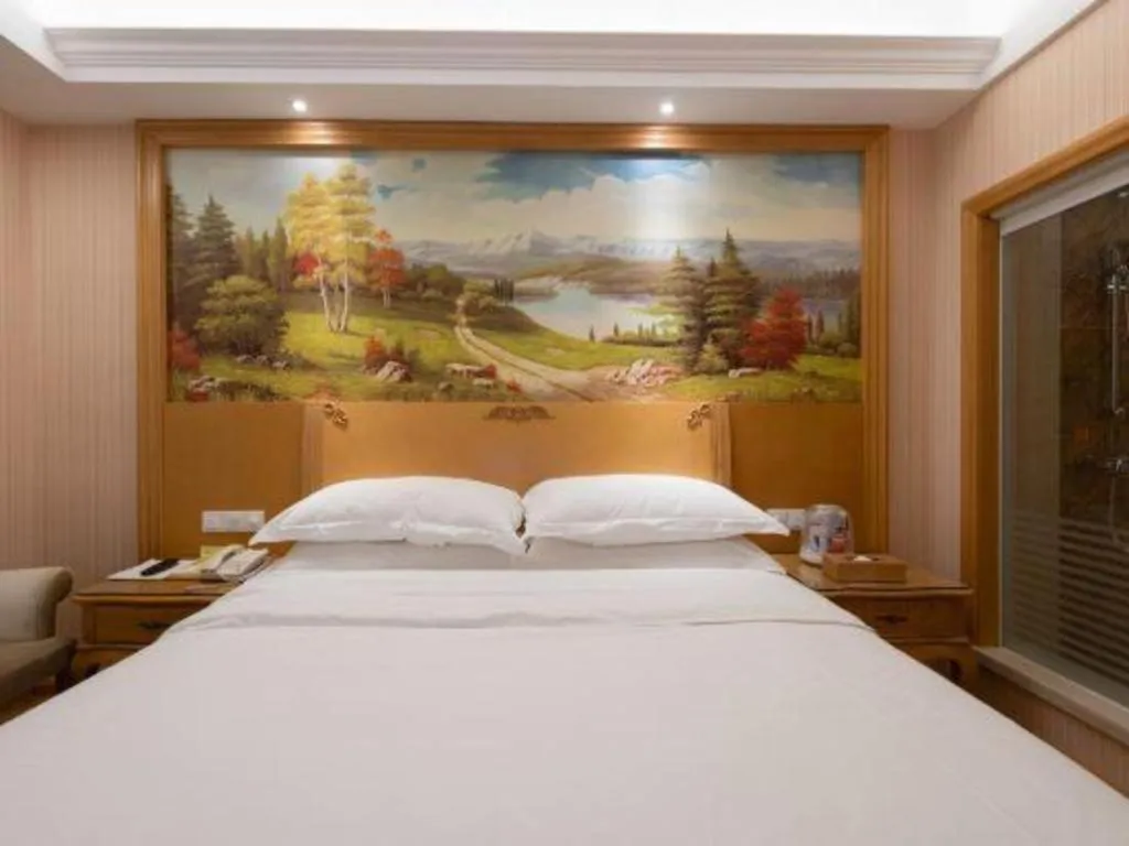 Bed in Vienna Hotel Guangzhou Huadu Sunac Cultural Tourism City Shiling