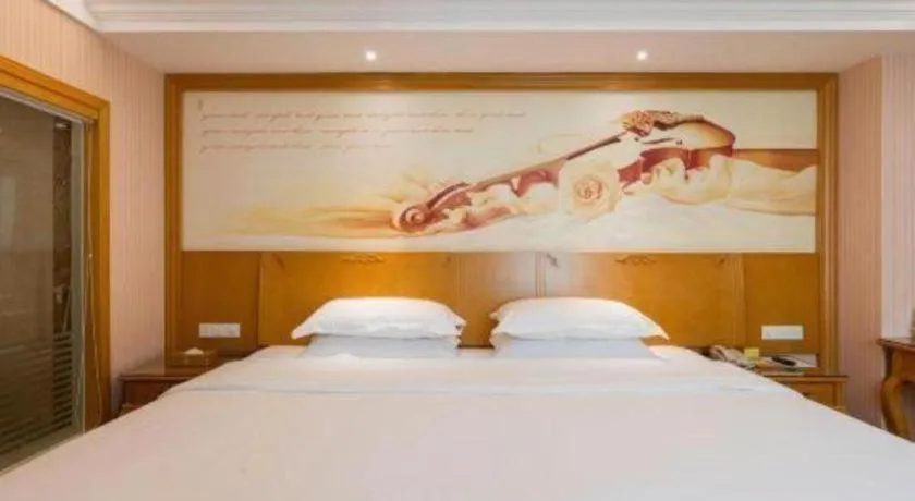 Bed in Vienna Hotel Guangzhou Huadu Sunac Cultural Tourism City Shiling