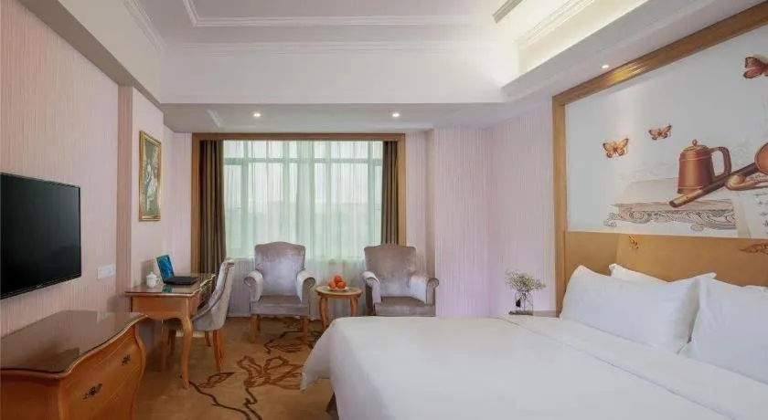 Bed in Vienna Hotel Guangzhou Huadu Sunac Cultural Tourism City Shiling