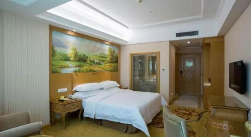 Bed in Vienna Hotel Guangzhou Huadu Sunac Cultural Tourism City Shiling