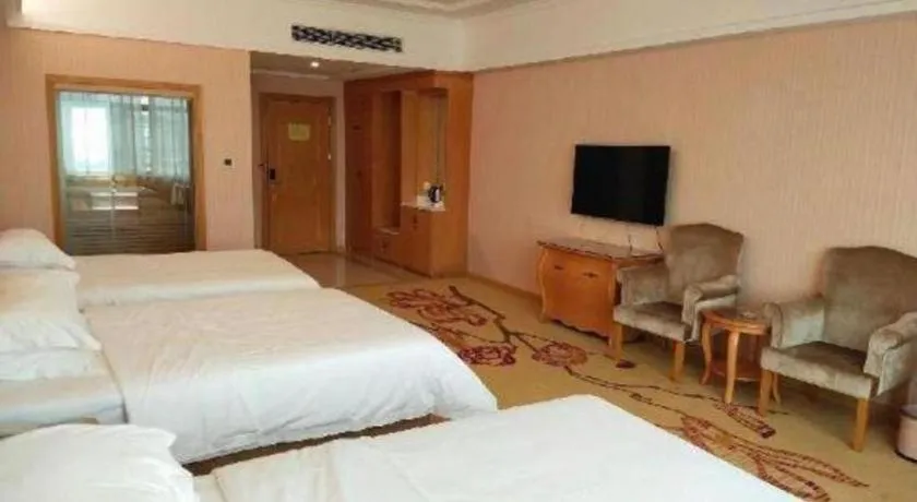 Bed in Vienna Hotel Guangzhou Huadu Sunac Cultural Tourism City Shiling