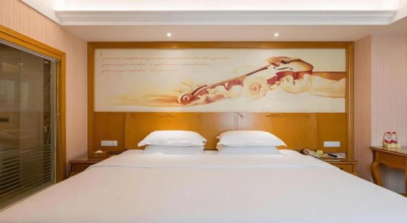 Bed in Vienna Hotel Guangzhou Huadu Sunac Cultural Tourism City Shiling