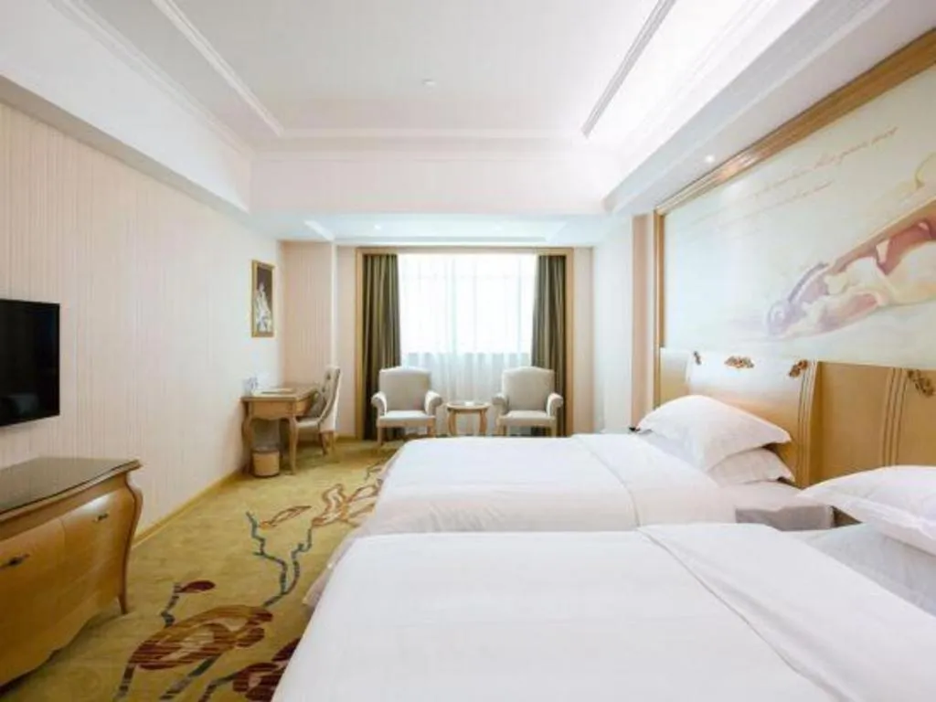 Bed in Vienna Hotel Guangzhou Huadu Sunac Cultural Tourism City Shiling