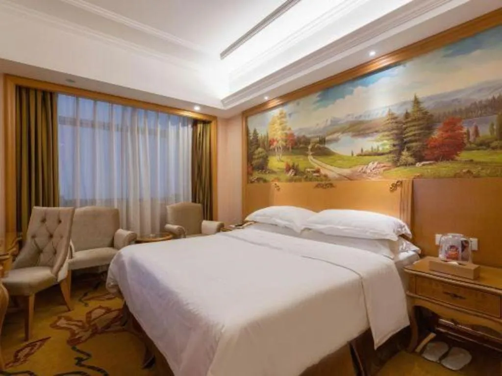 Bed in Vienna Hotel Guangzhou Huadu Sunac Cultural Tourism City Shiling