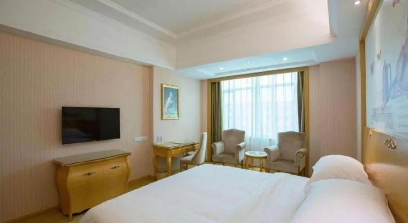 Bed in Vienna Hotel Guangzhou Huadu Sunac Cultural Tourism City Shiling