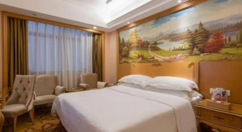 Bed in Vienna Hotel Guangzhou Huadu Sunac Cultural Tourism City Shiling