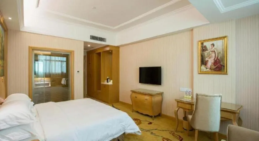 Bed in Vienna Hotel Guangzhou Huadu Sunac Cultural Tourism City Shiling