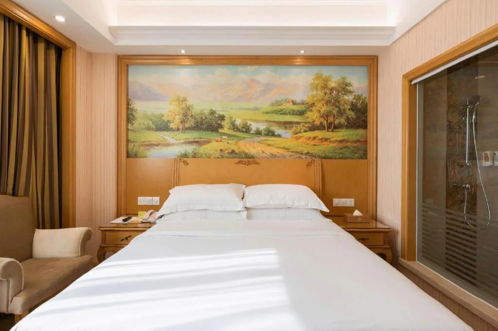 Bed in Vienna Hotel Guangzhou Huadu Sunac Cultural Tourism City Shiling
