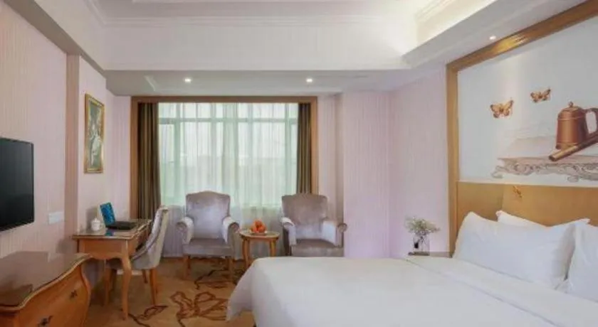 Bed in Vienna Hotel Guangzhou Huadu Sunac Cultural Tourism City Shiling
