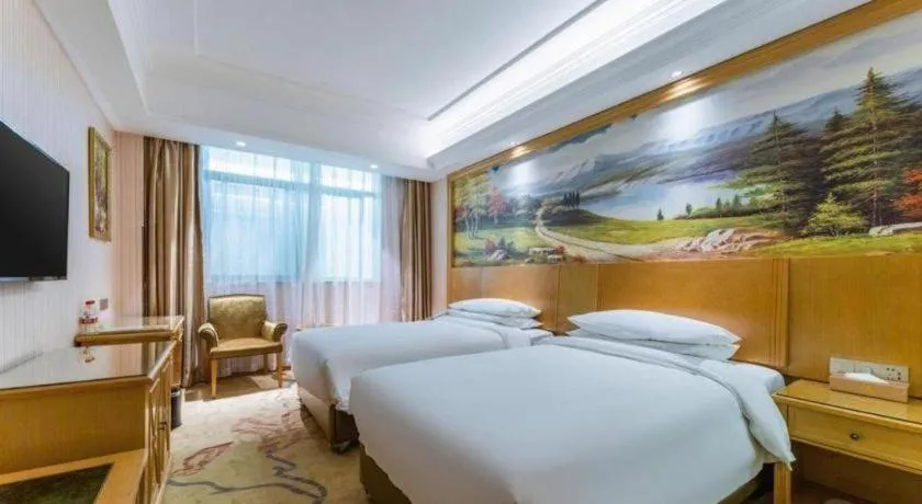 Bed in Vienna Hotel Hubei Xiangyang Tang City Gulou