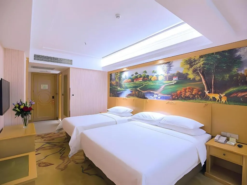 Bed in Vienna Hotel Hubei Xiangyang Tang City Gulou