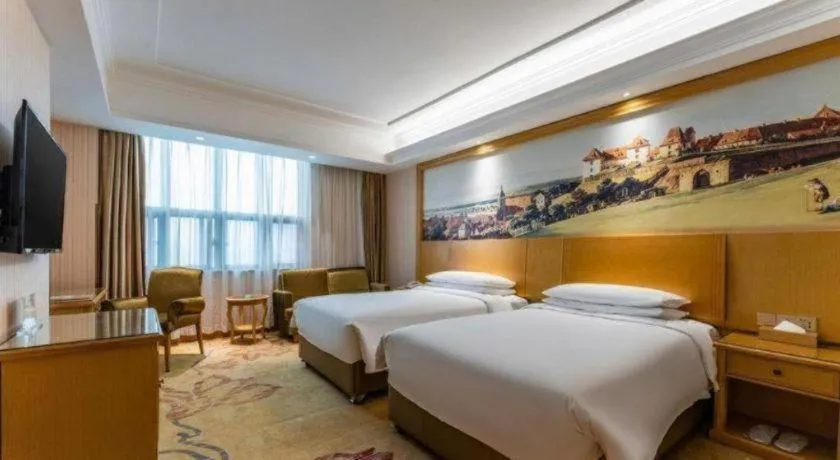 Bed in Vienna Hotel Hubei Xiangyang Tang City Gulou