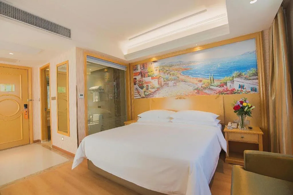 Bed in Vienna Hotel Hubei Xiangyang Tang City Gulou