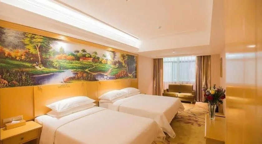 Bed in Vienna Hotel Hubei Xiangyang Tang City Gulou
