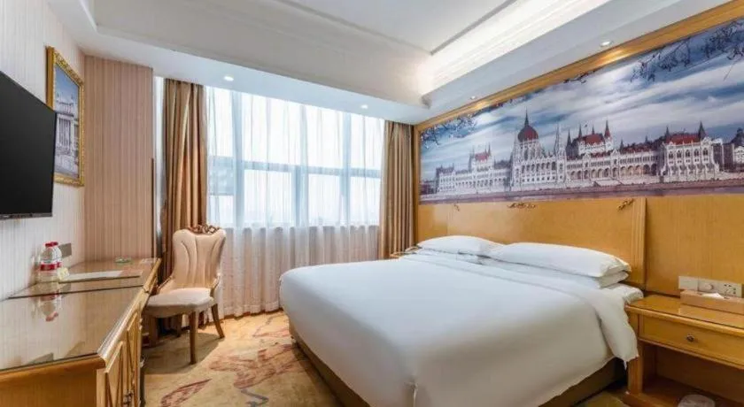 Bed in Vienna Hotel Hubei Xiangyang Tang City Gulou