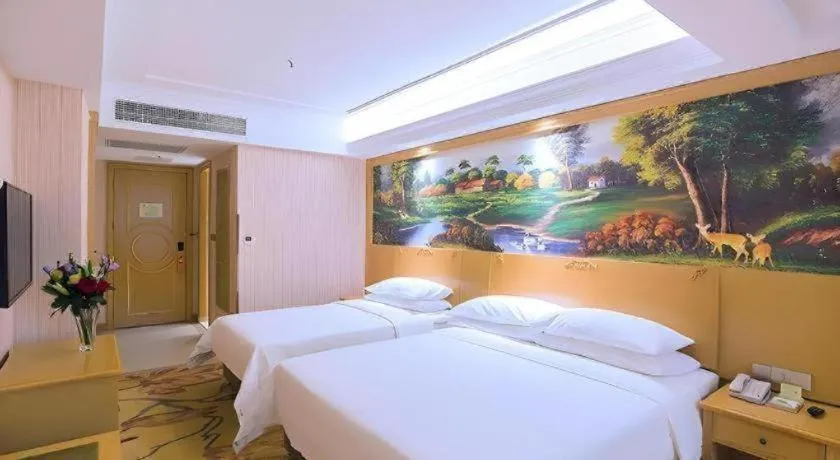 Bed in Vienna Hotel Hubei Xiangyang Tang City Gulou