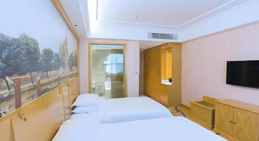 Bed in Vienna Hotel Hubei Xiangyang Tang City Gulou
