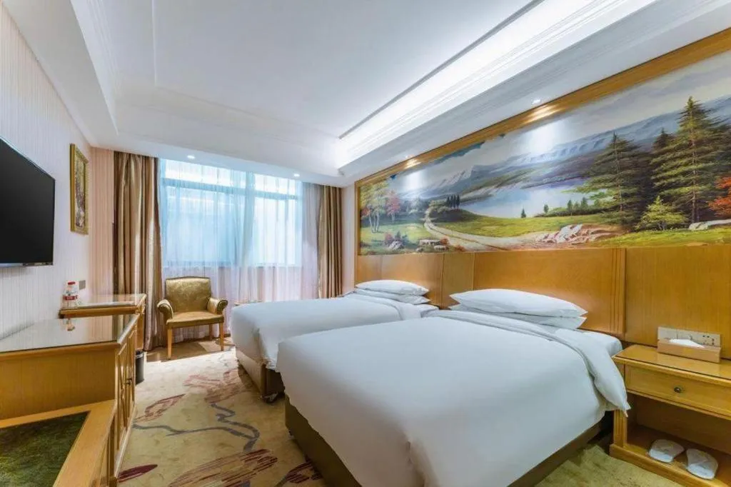 Bed in Vienna Hotel Hubei Xiangyang Tang City Gulou