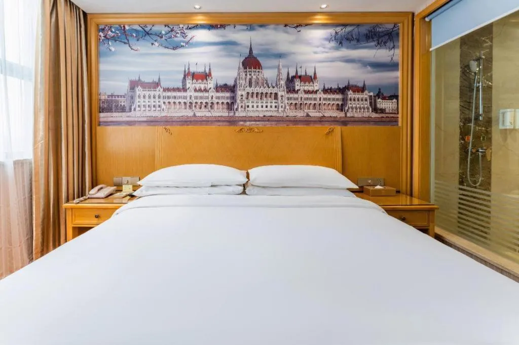 Bed in Vienna Hotel Hubei Xiangyang Tang City Gulou