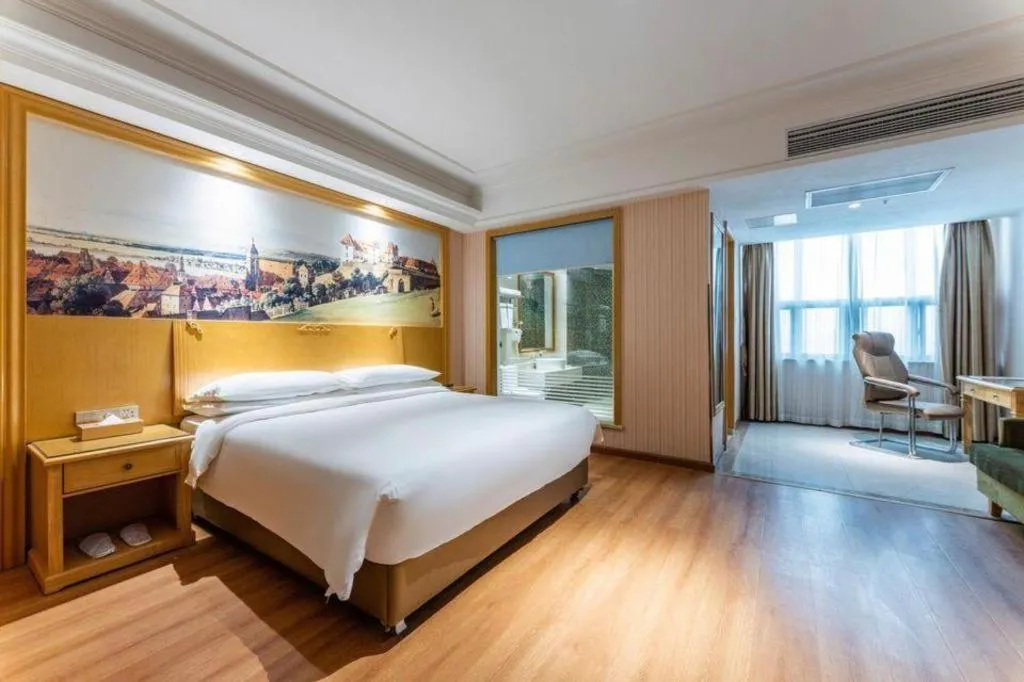Bed in Vienna Hotel Hubei Xiangyang Tang City Gulou
