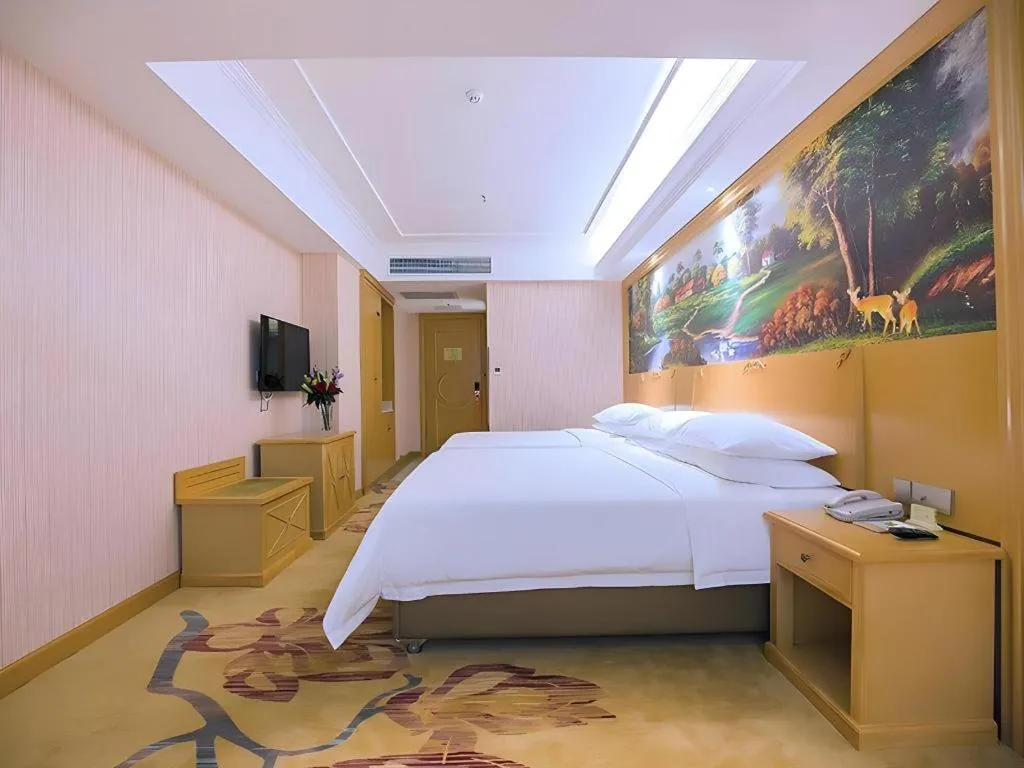 Bed in Vienna Hotel Hubei Xiangyang Tang City Gulou