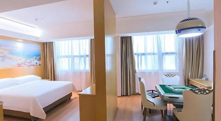 Bed in Vienna Hotel Hubei Xiangyang Tang City Gulou
