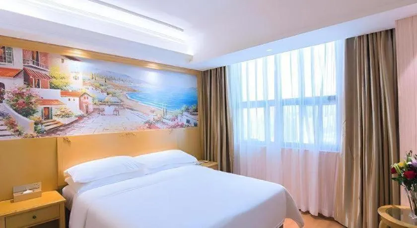 Bed in Vienna Hotel Hubei Xiangyang Tang City Gulou