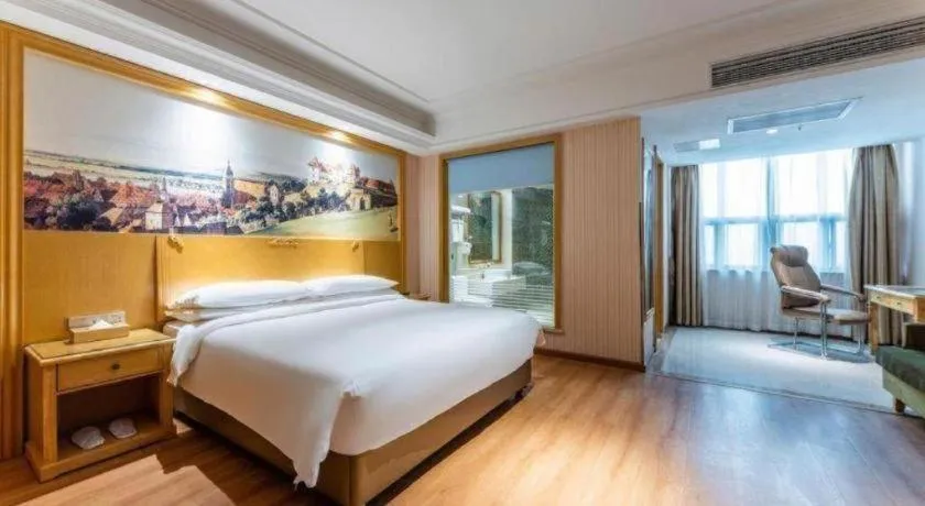 Bed in Vienna Hotel Hubei Xiangyang Tang City Gulou