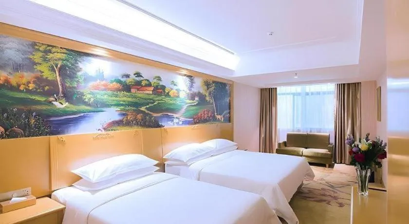 Bed in Vienna Hotel Hubei Xiangyang Tang City Gulou