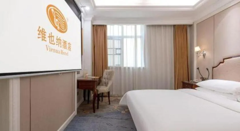 Bed in Vienna Hotel Guangzhou Baiyun College Jinyuan Plaza