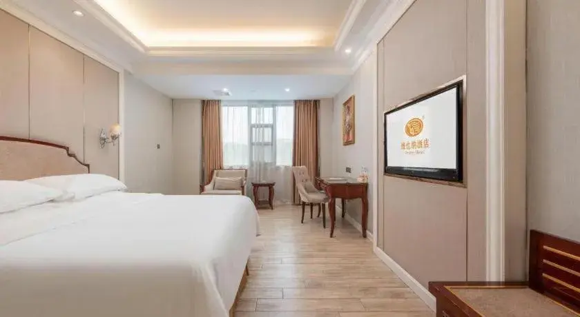 Bed in Vienna Hotel Guangzhou Baiyun College Jinyuan Plaza Bed in Vienna Hotel Guangzhou Baiyun College Jinyuan Plaza