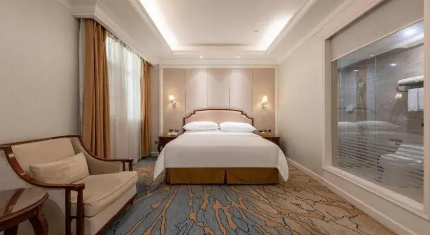 Bed in Vienna Hotel Guangzhou Baiyun College Jinyuan Plaza Bed in Vienna Hotel Guangzhou Baiyun College Jinyuan Plaza