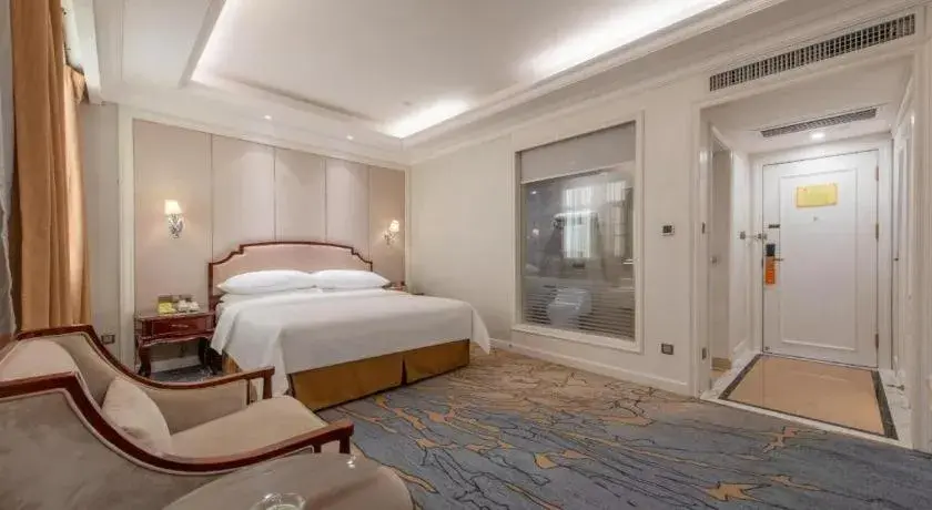 Bed in Vienna Hotel Guangzhou Baiyun College Jinyuan Plaza Bed in Vienna Hotel Guangzhou Baiyun College Jinyuan Plaza