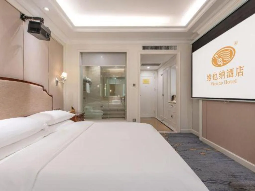 Bed in Vienna Hotel Guangzhou Baiyun College Jinyuan Plaza