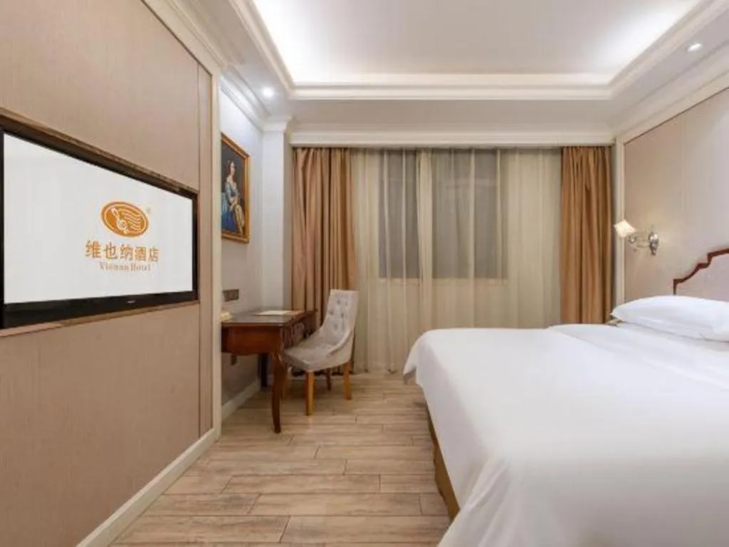 Bed in Vienna Hotel Guangzhou Baiyun College Jinyuan Plaza
